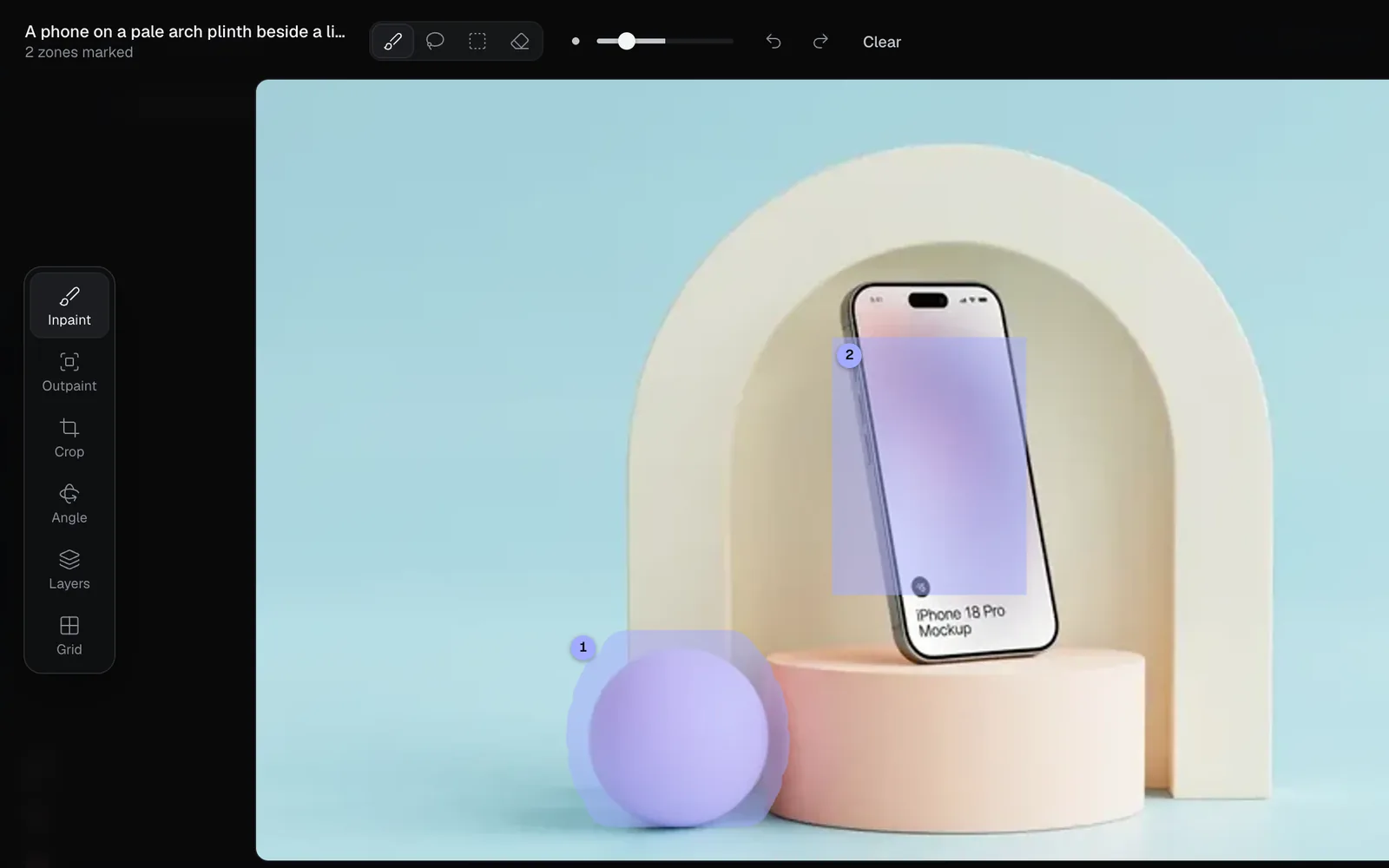 The bar above the picture: the title and 2 zones marked, the Brush, Lasso, Box and Eraser buttons, the brush size slider, undo, redo and Clear; the sphere is brushed as zone 1 and the phone's screen is boxed as zone 2