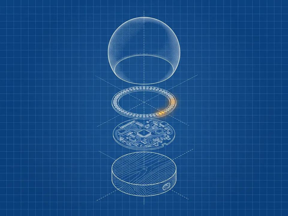 Exploded blueprint: White linework on a blue grid, one amber accent